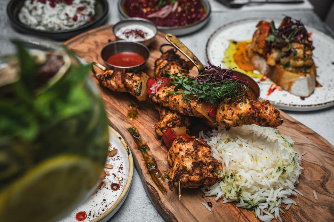 La Turka Northwich, serving chicken skewers with rice